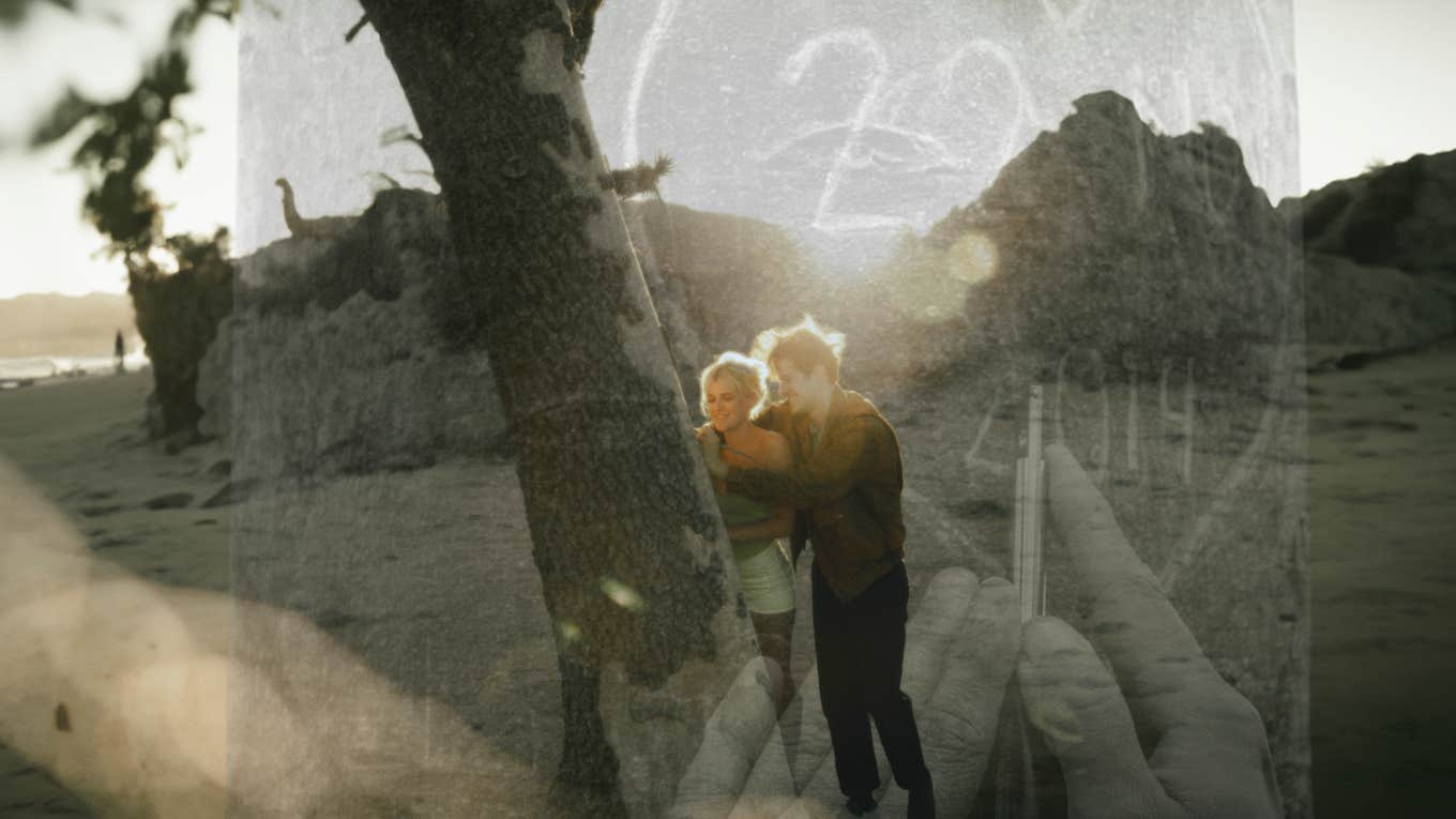 Couple carving a heart into a tree, romantic love 