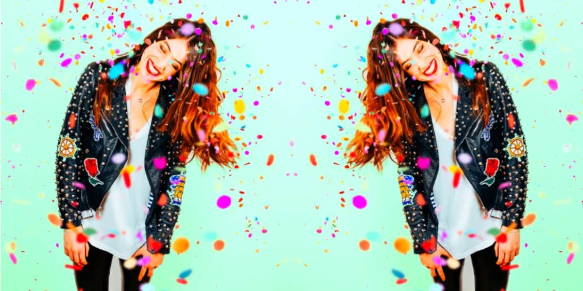 The Colors You Choose In This Personality Test Reveals How Many Past Lives You Have Lived woman surrounded by confetti