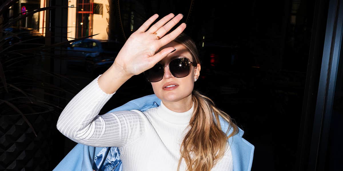 Signs You're In Love With A Clingy Texter woman covering her face