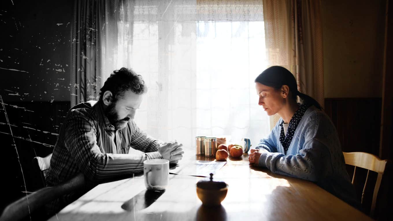 Woman sitting across from spouse at table 