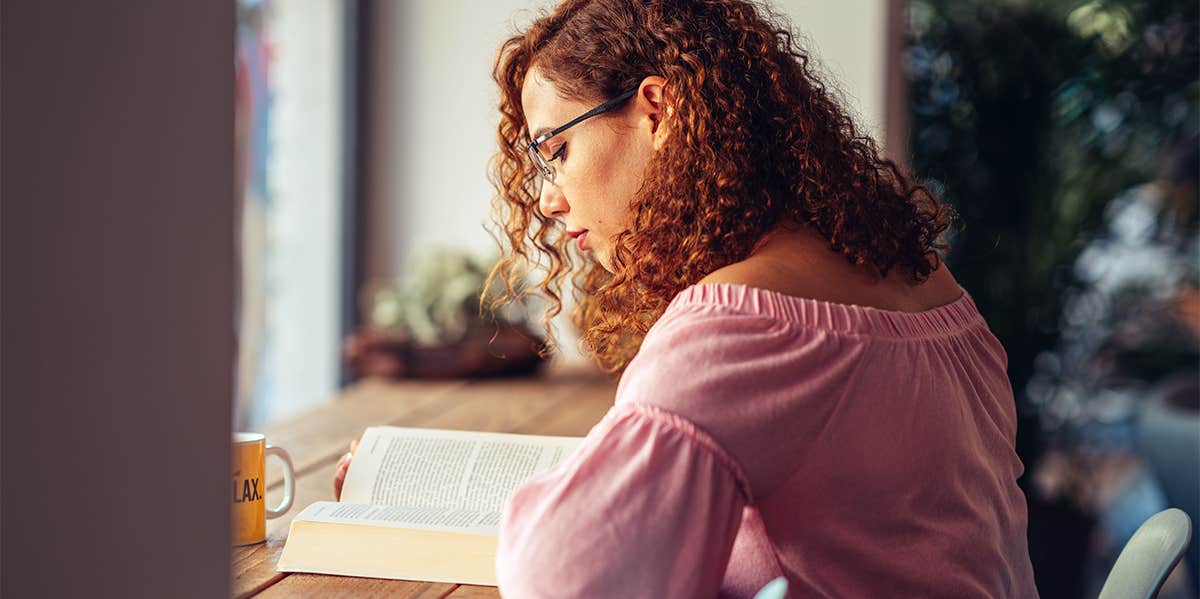 woman reading book