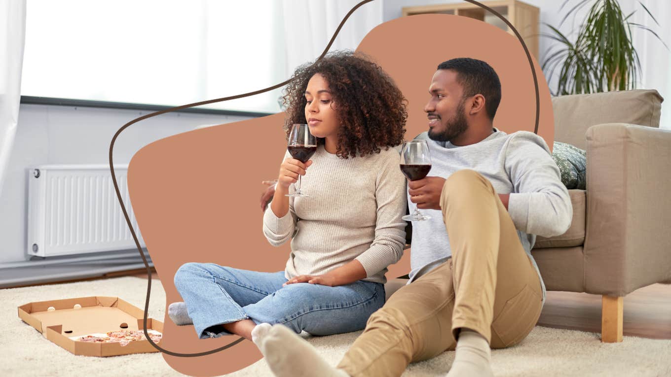 Couple on the floor eating dinner