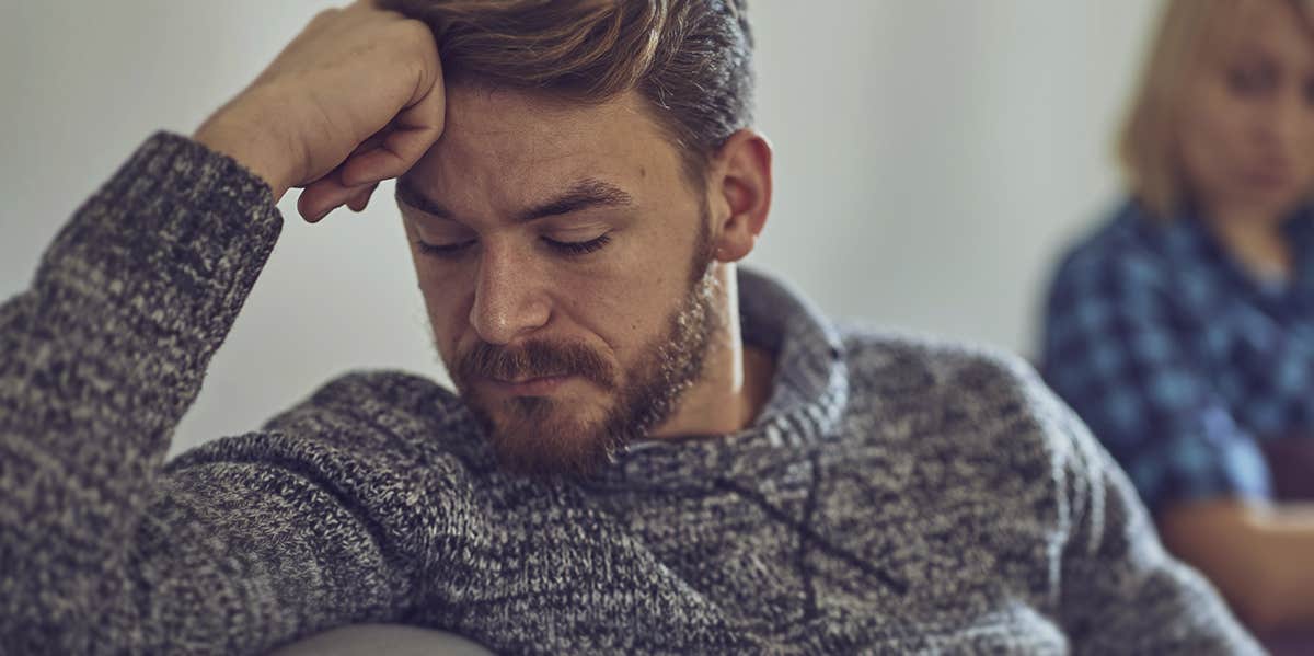 Why This One Repressed Emotion Is Ruining Your Relationship man looking depressed