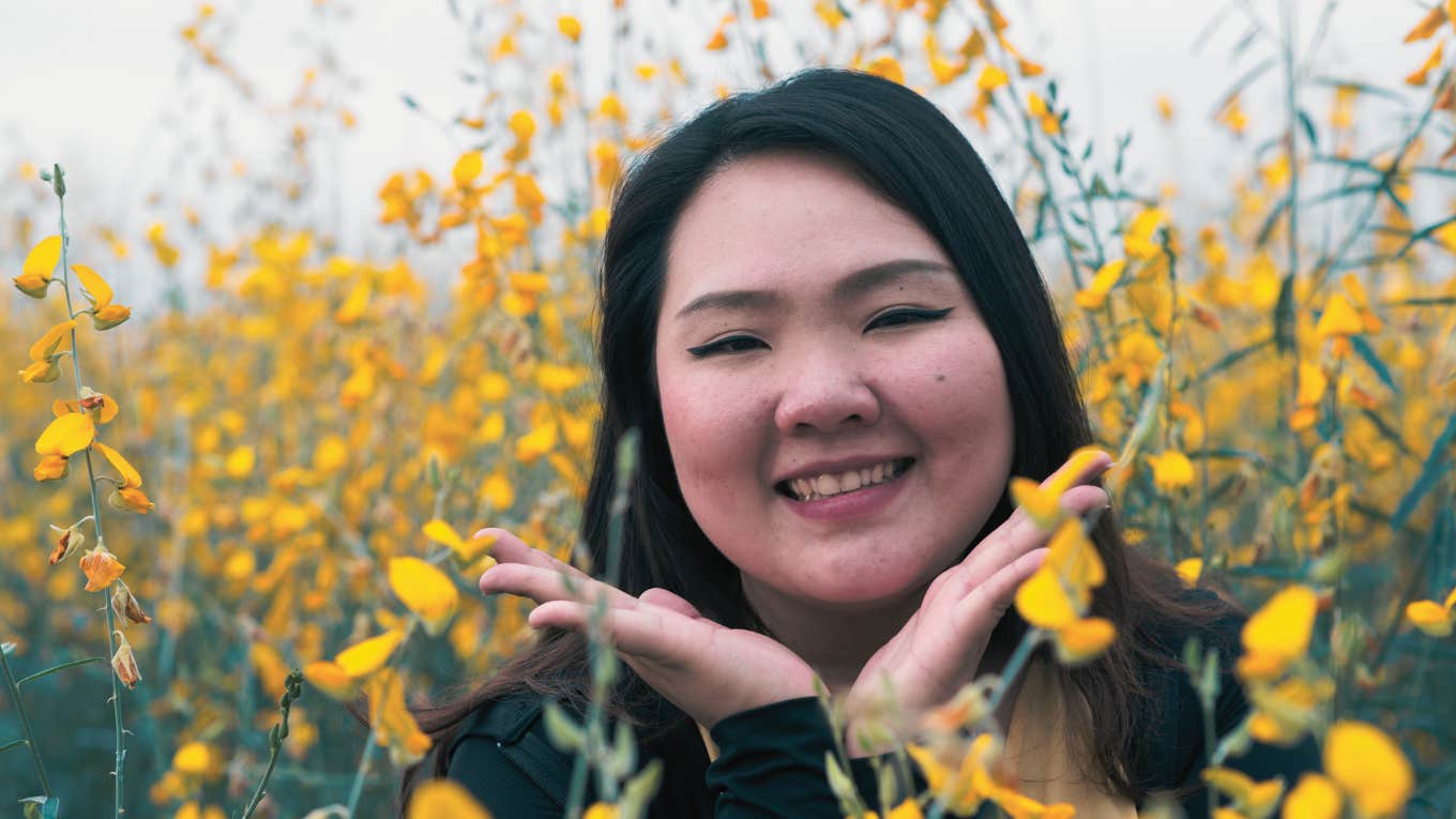 smiling woman in field