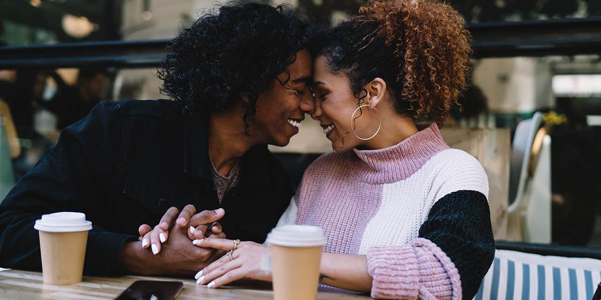 smiling couple on cafe date