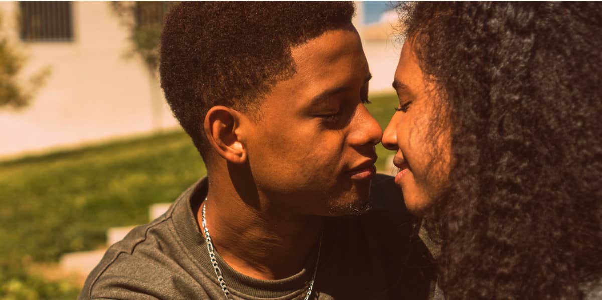 man and woman looking at each other close