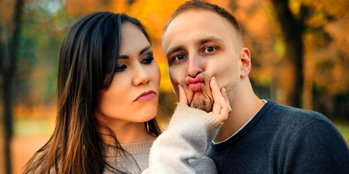 woman holding boyfriend's lips because he's a liar