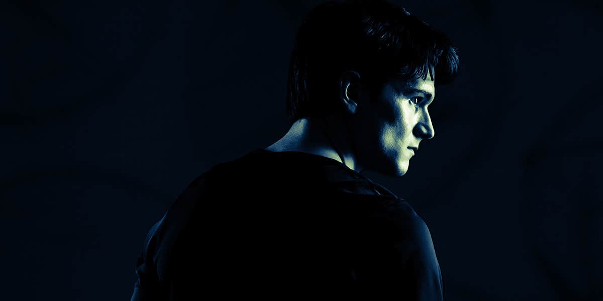 The Biggest Tell Of A Narcissist, According To Research mysterious guy in dark room