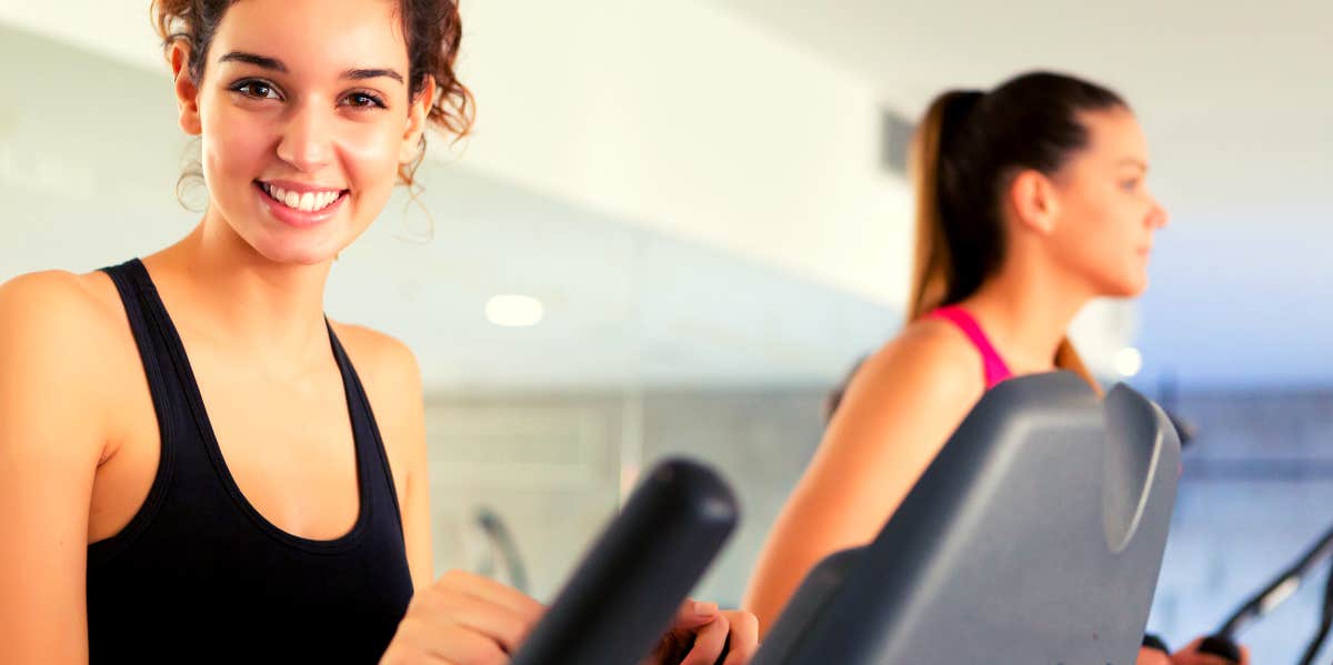 woman on elliptical machine at the gym