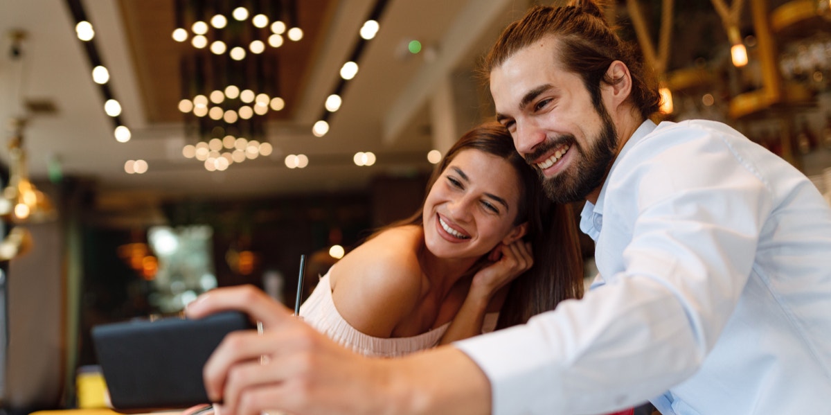 dating couple taking selfie