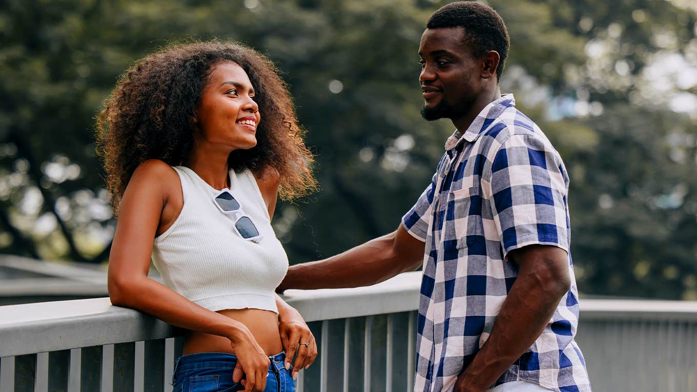 6 Tiny Ways To Be More Attractive When Dating guy and girl flirting on date