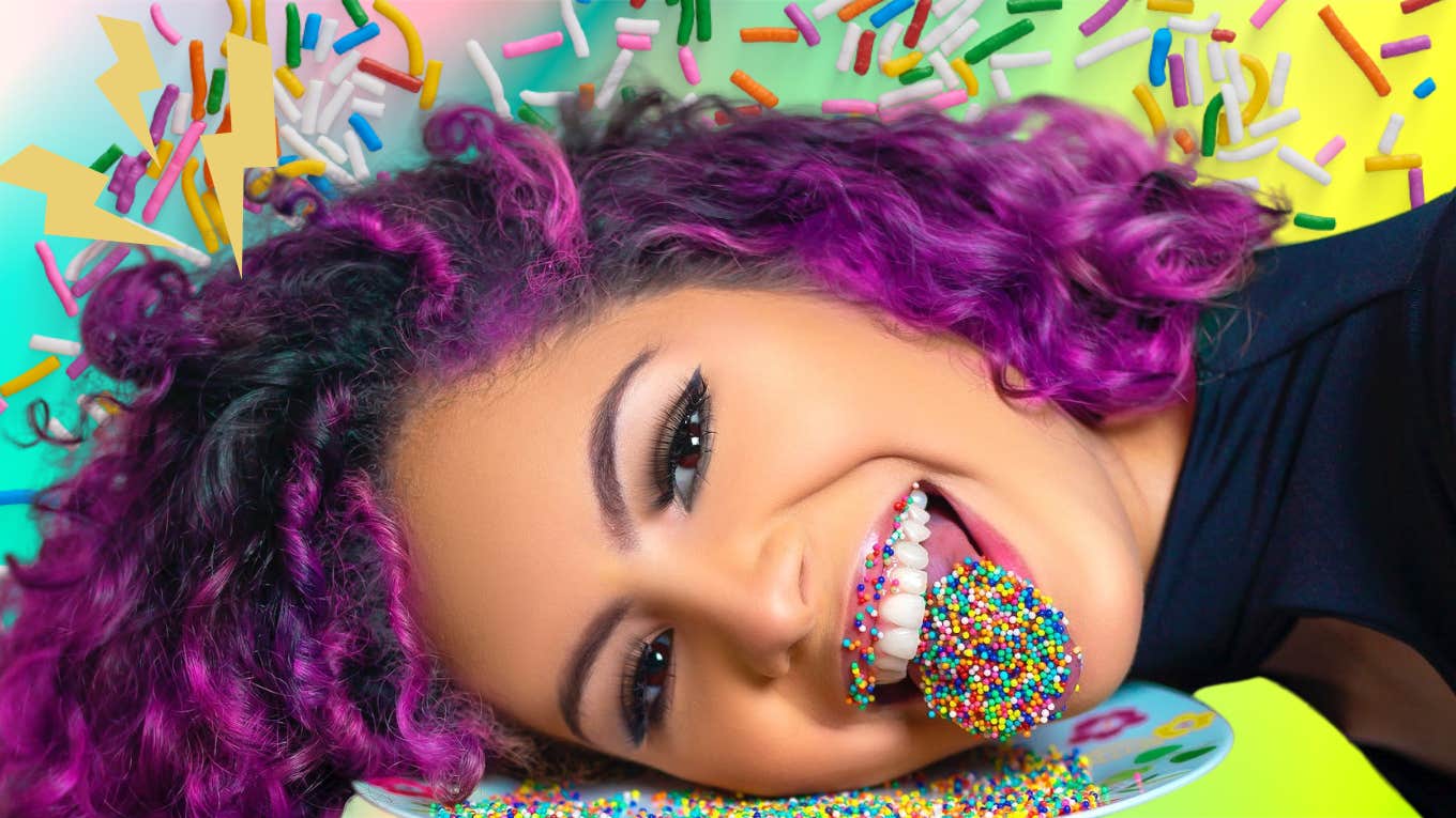 Confident woman playing with sprinkles 