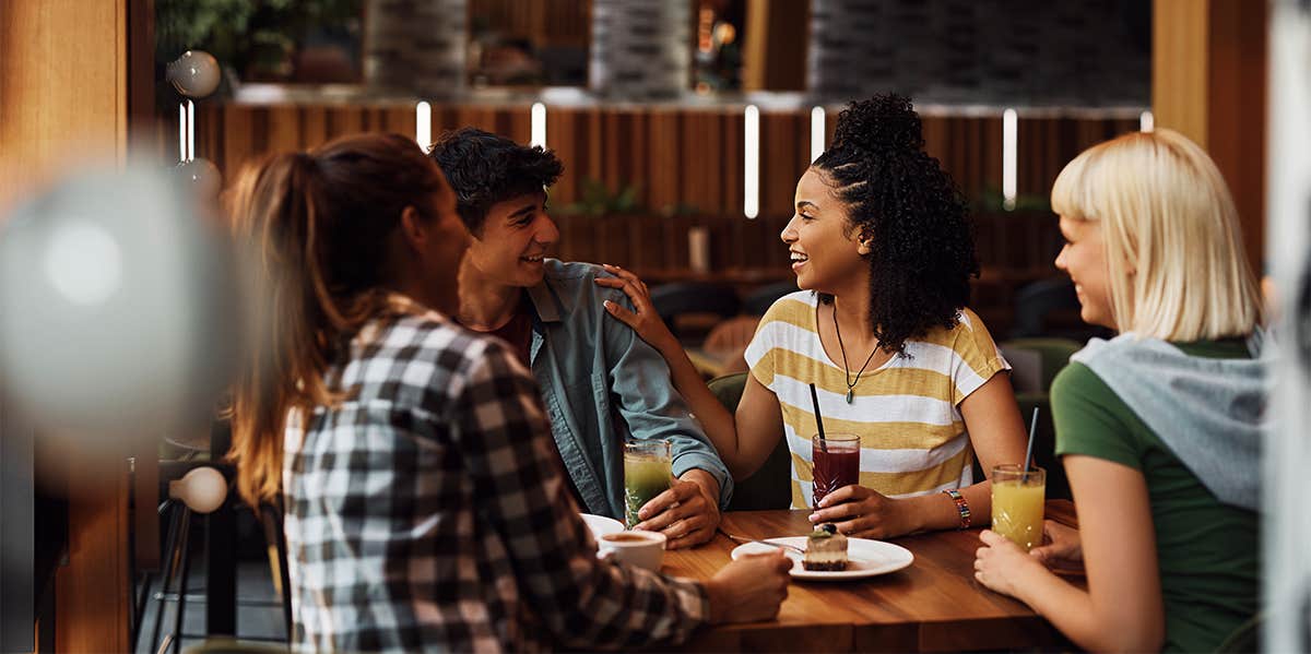 Conversational Tricks To Charm The Pants Out Of Literally Anyone friends talking at restaurant