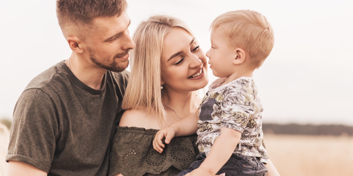 mom and dad with toddler son