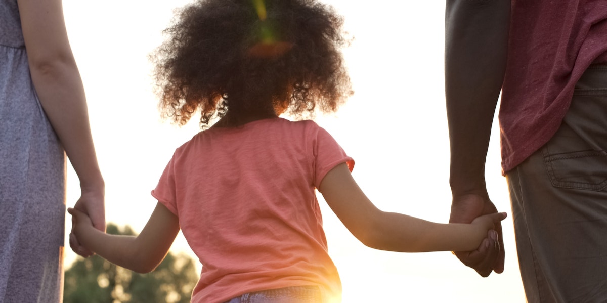 5 Ways To Be The Best Parent Your Child Needs — At Every Age parents holding daughter's hand
