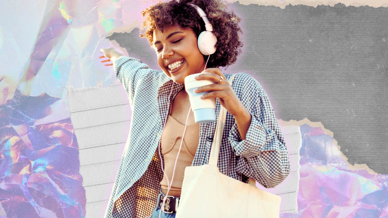 Woman listening to music happily with tea