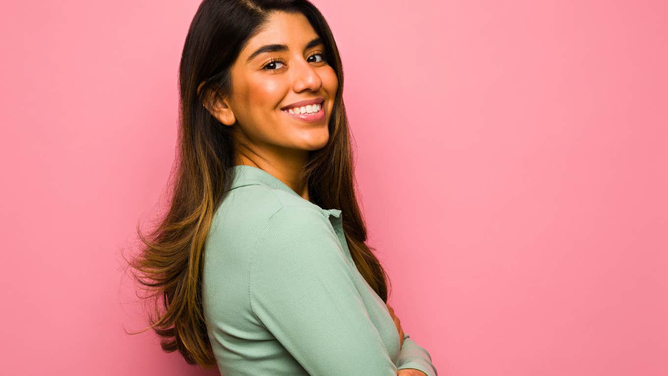 confident smiling woman looking at the camera