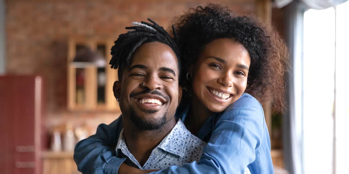 Portrait of smiling loving sincere couple