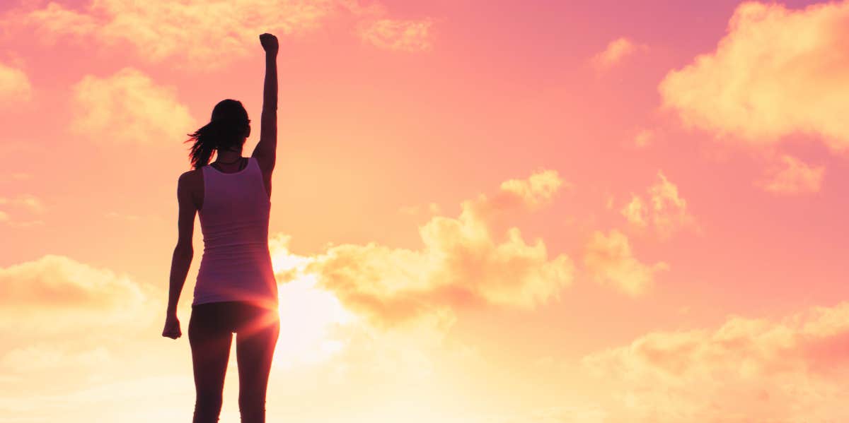 strong woman with fist up