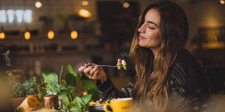 woman eating alone