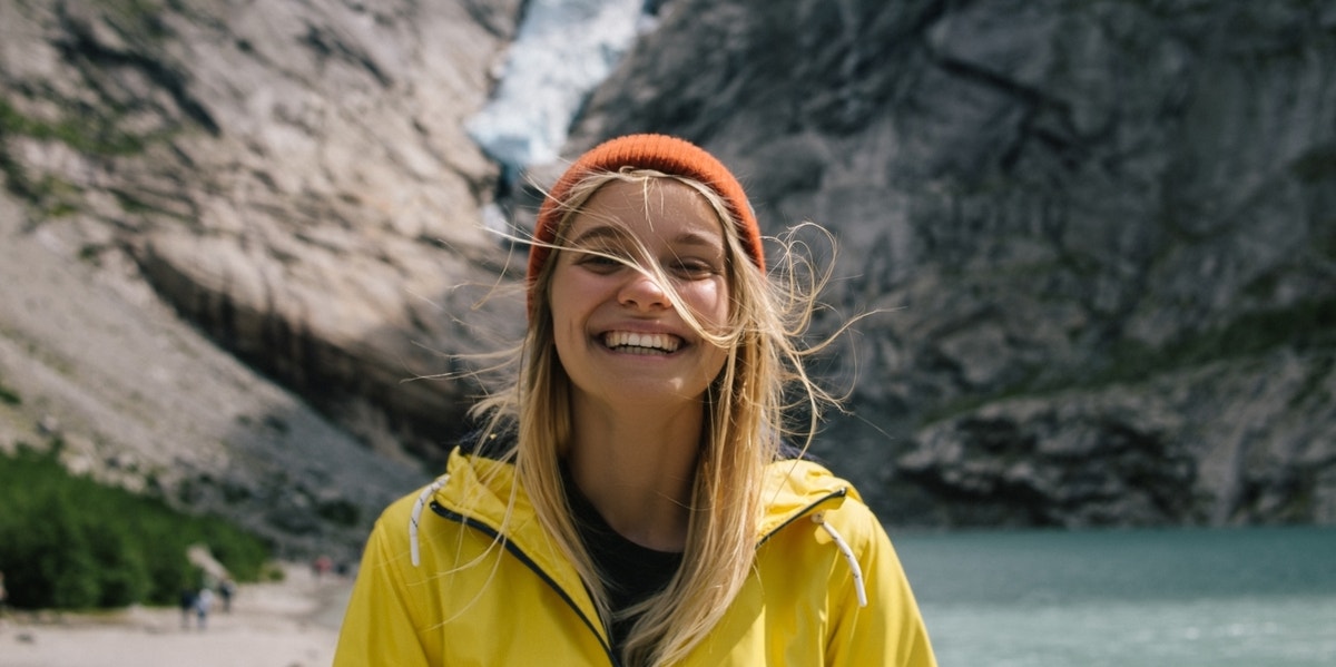 10 Ways To Become A Better Version Of Yourself smiling woman outdoors