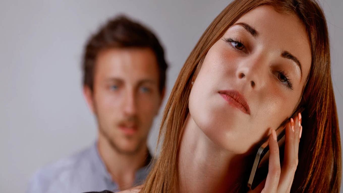 man talking to woman on the phone