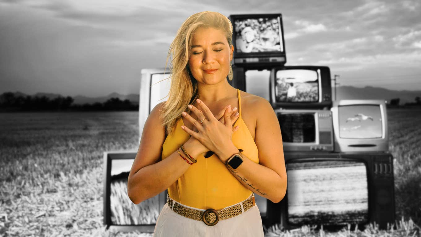 woman finding calm amidst a field of televisions