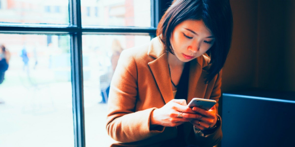 woman networking on her phone