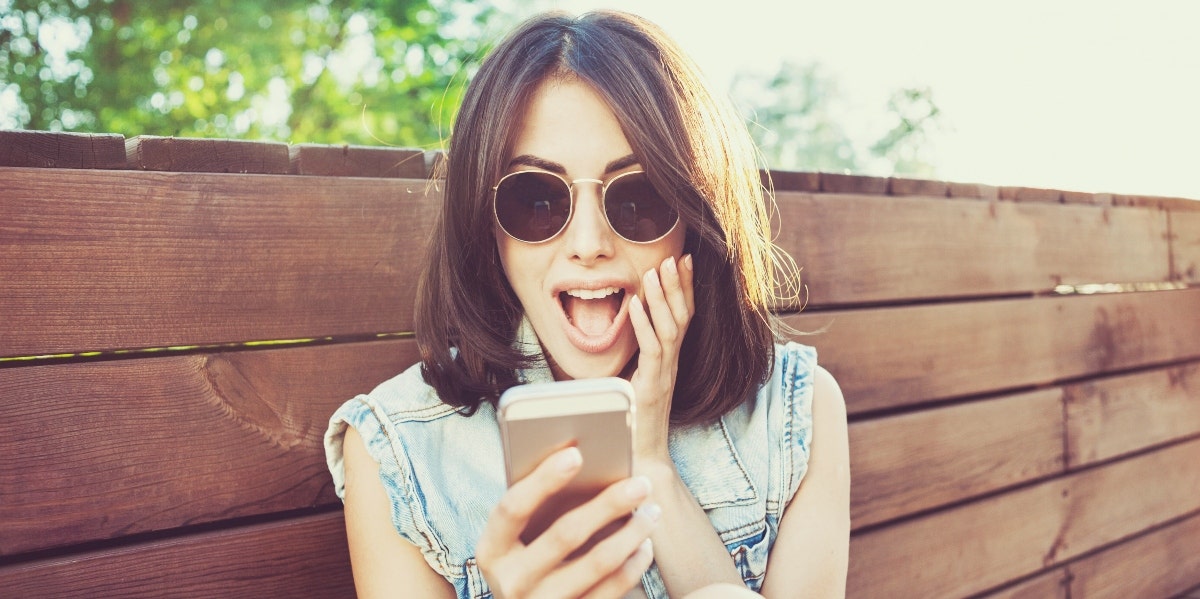 Woman in sunglasses having fun living as her authentic self 