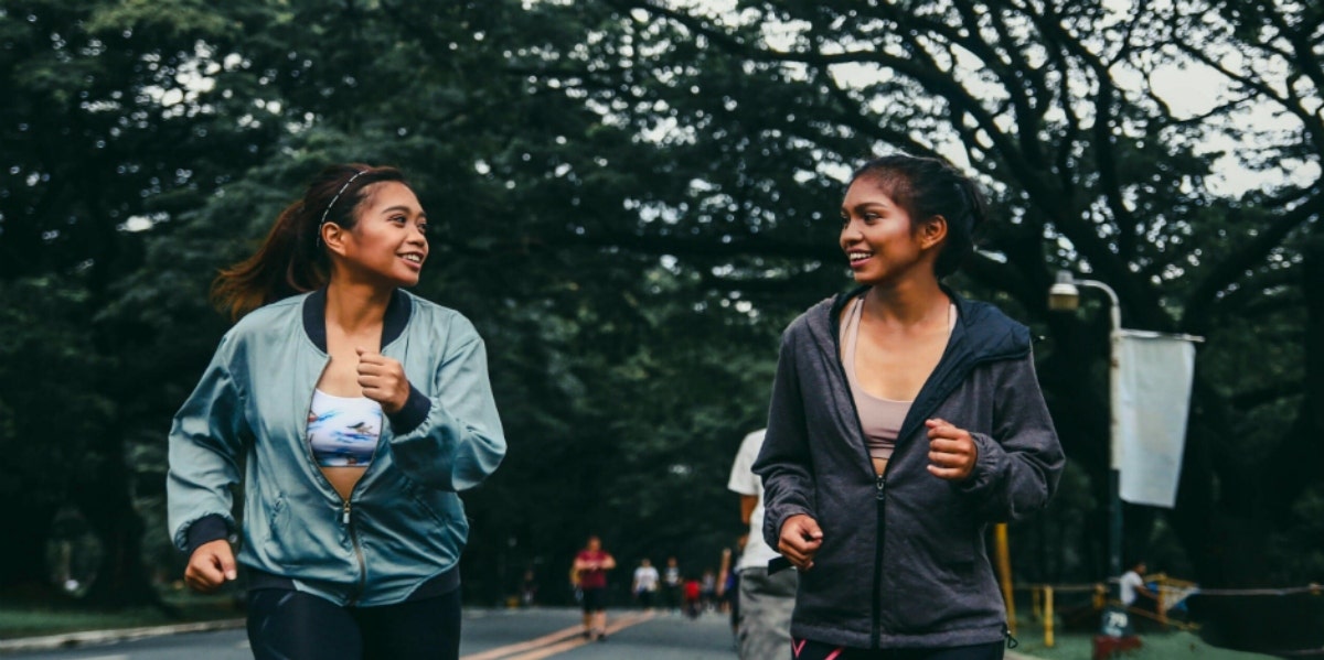 two sisters jogging together
