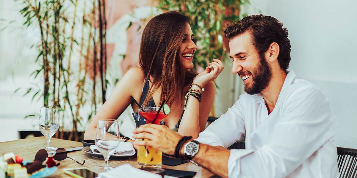 man and woman on dinner date