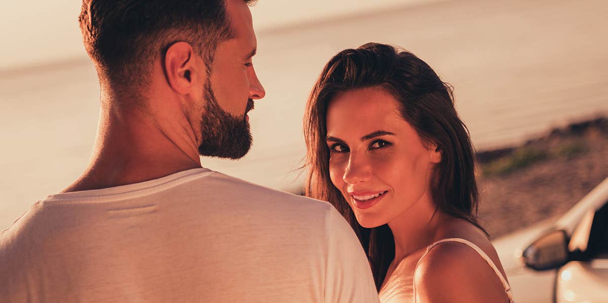 Men With These Rare Personality Traits Make Women Swoon couple at sunset