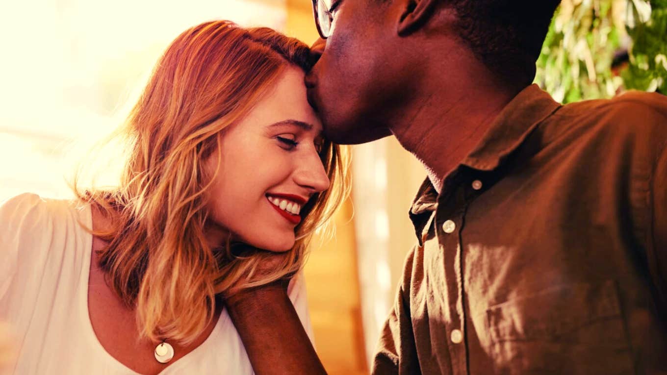 How To Get The Man You Love To Be A Better Husband man kissing woman on the forehead
