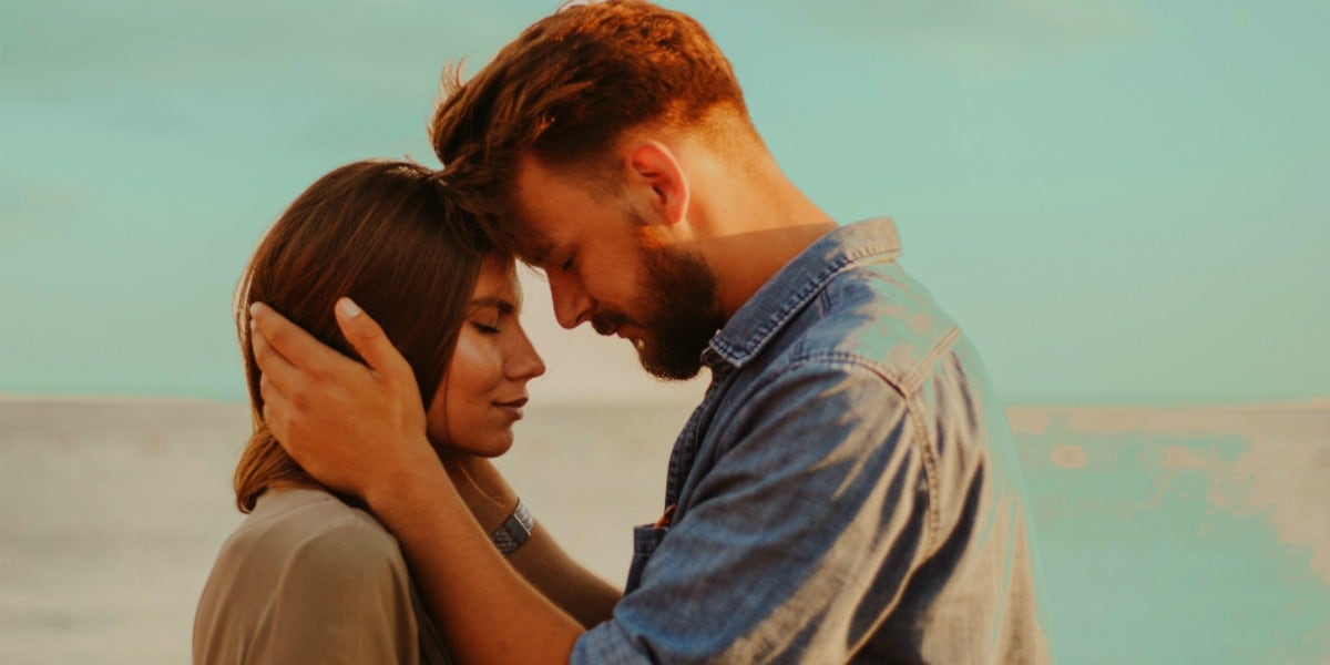 divorced man and woman hugging how to get over ex