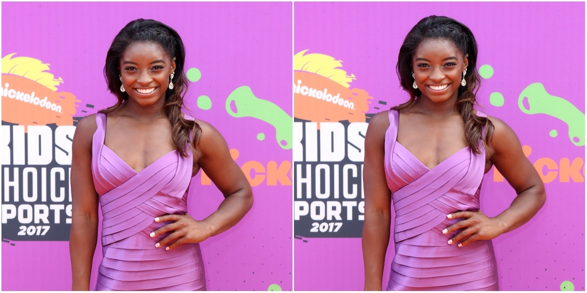 mirrored image of Simone Biles at a red carpet