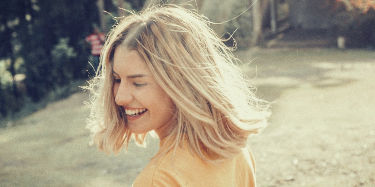 carefree happy woman in a field