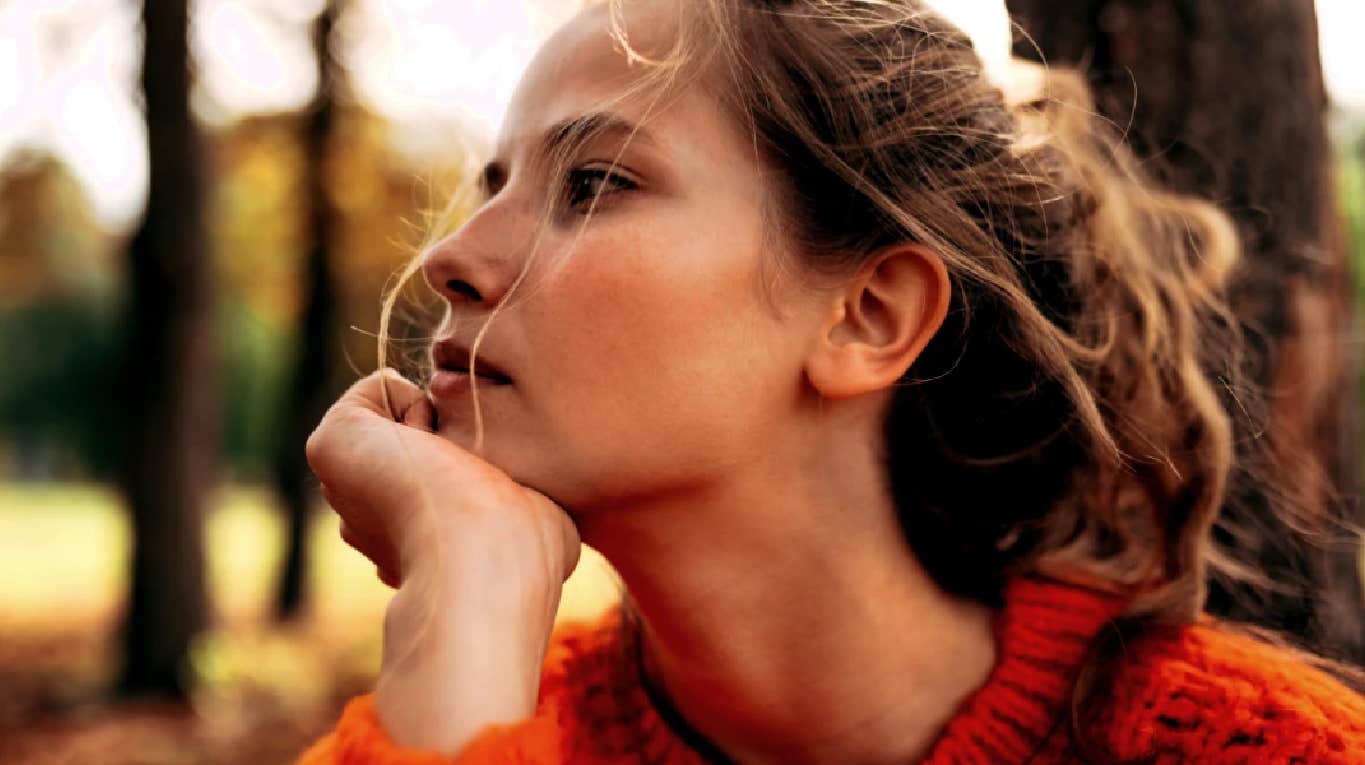 How To Heal Your Weary, Broken Heart woman with her chin in her hand thinking