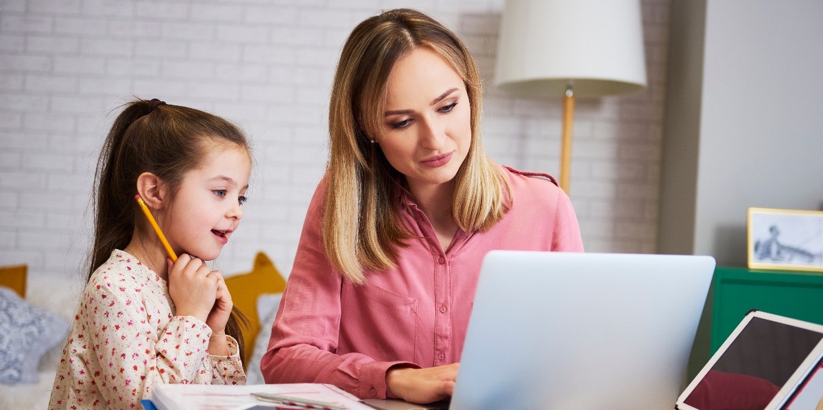 mother and daughter homeschooling 