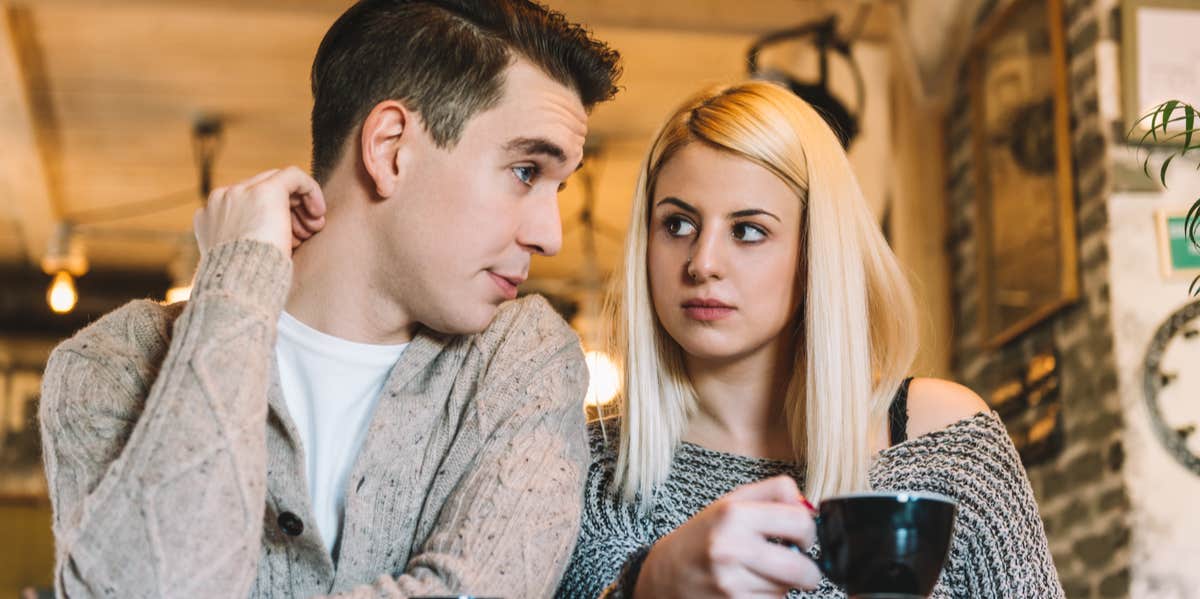 man and woman talking