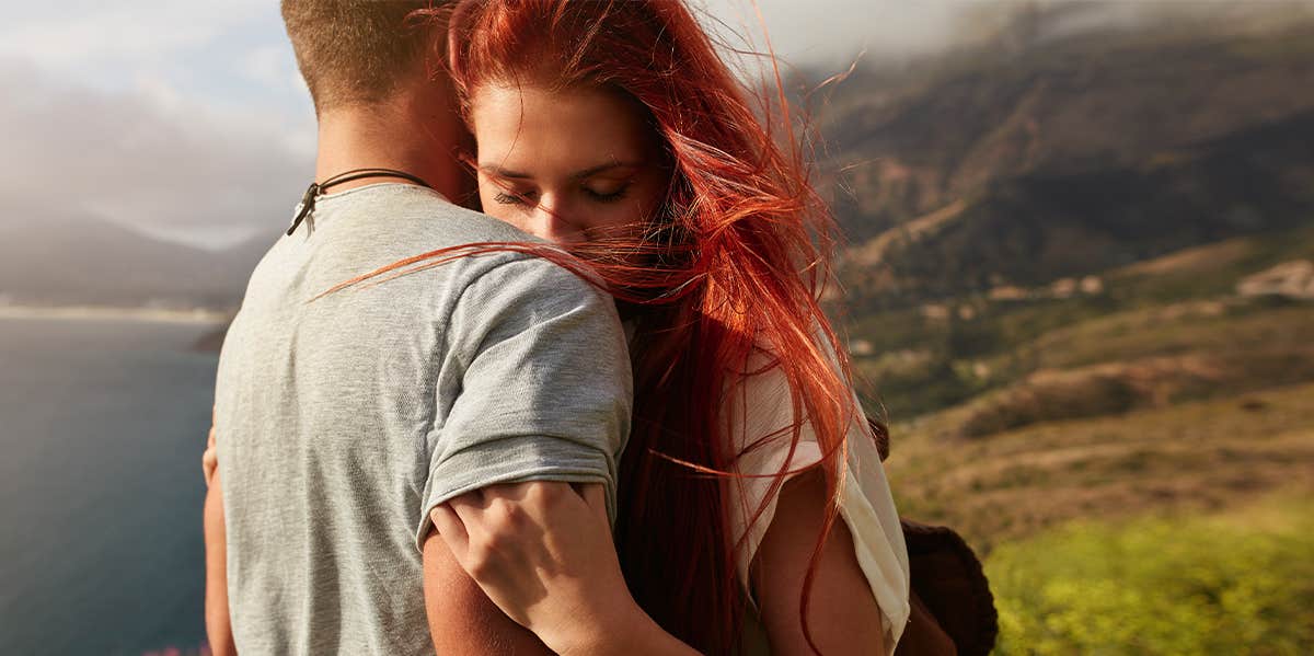 5 Little Signs You Can Trust Someone Completely woman hugging man