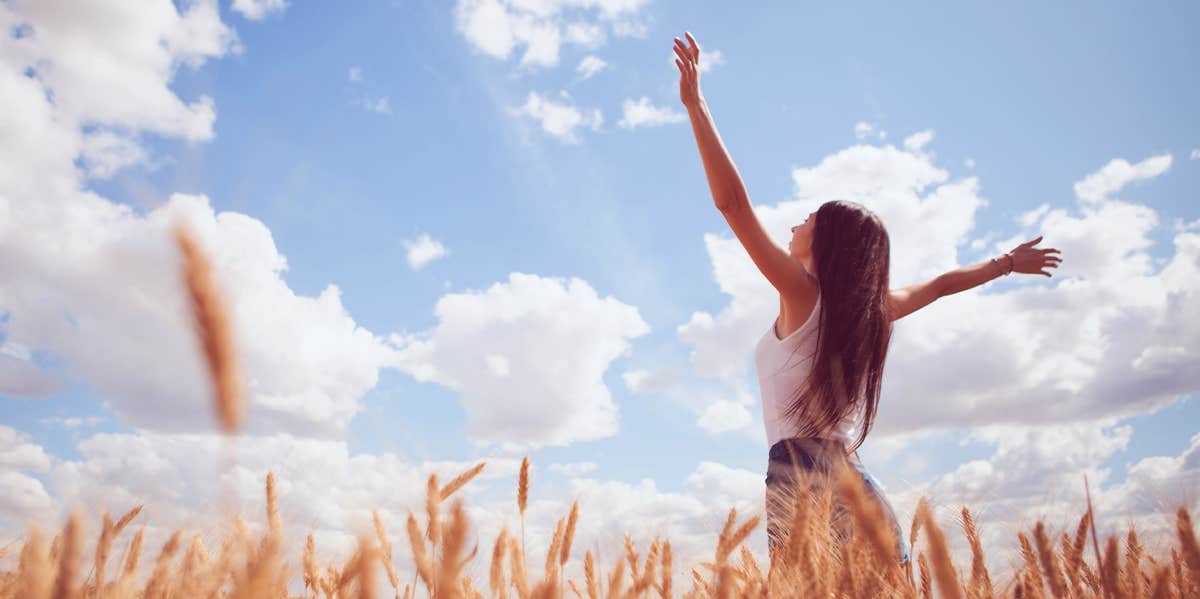 happy woman in field