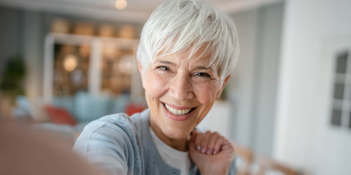 older woman taking selfie