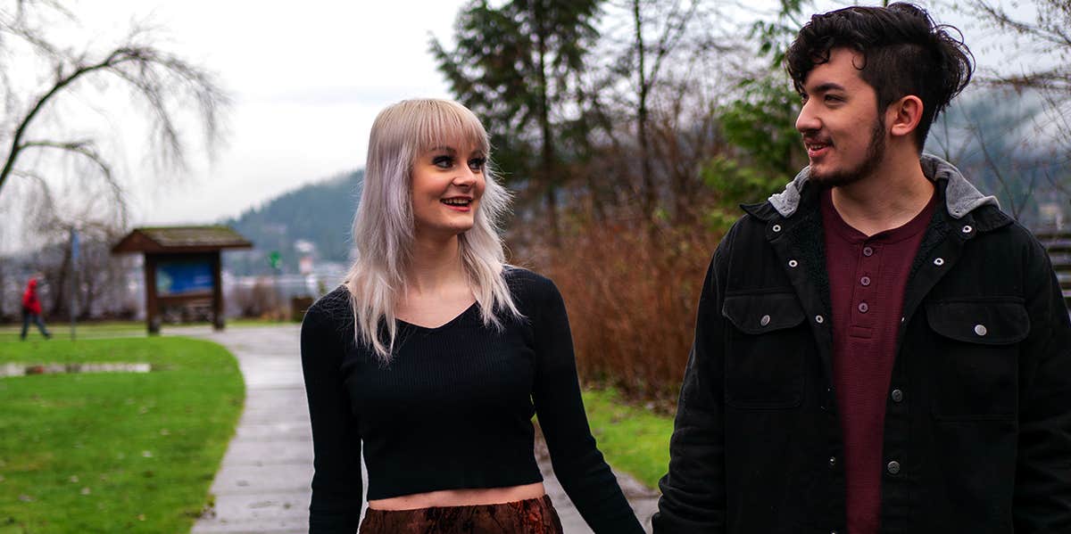 If You Keep Up These 5 Habits, He'll Fall For You — Without Even Touching You man and woman holding hands walking together