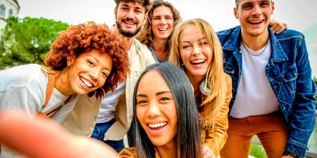 group of friends smiling for a selfie