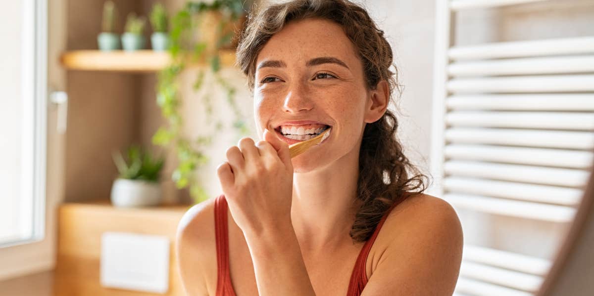 Woman brushing her teeth