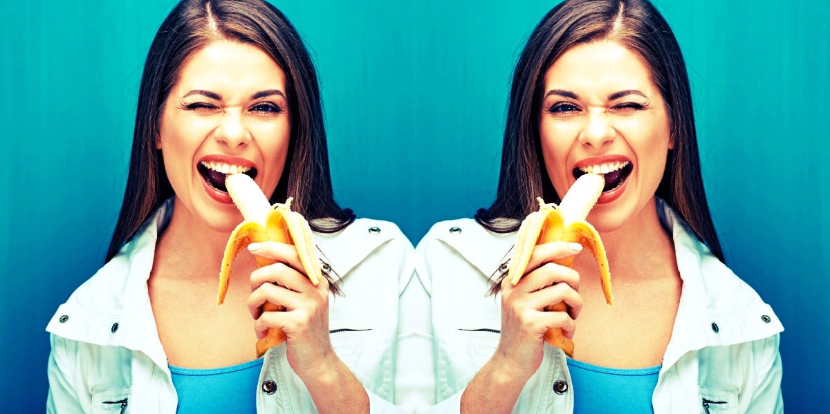 woman eating banana