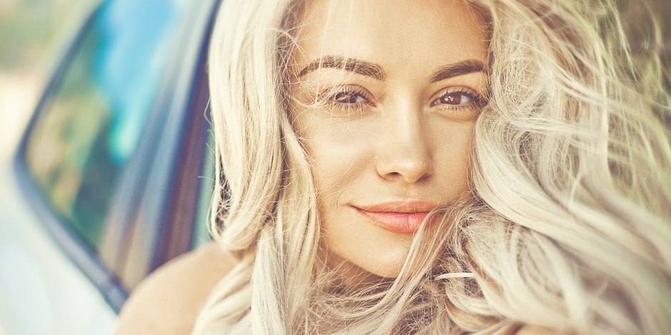 photo of woman with wavy blonde hair