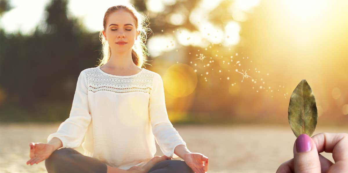 woman meditating with bay leaves