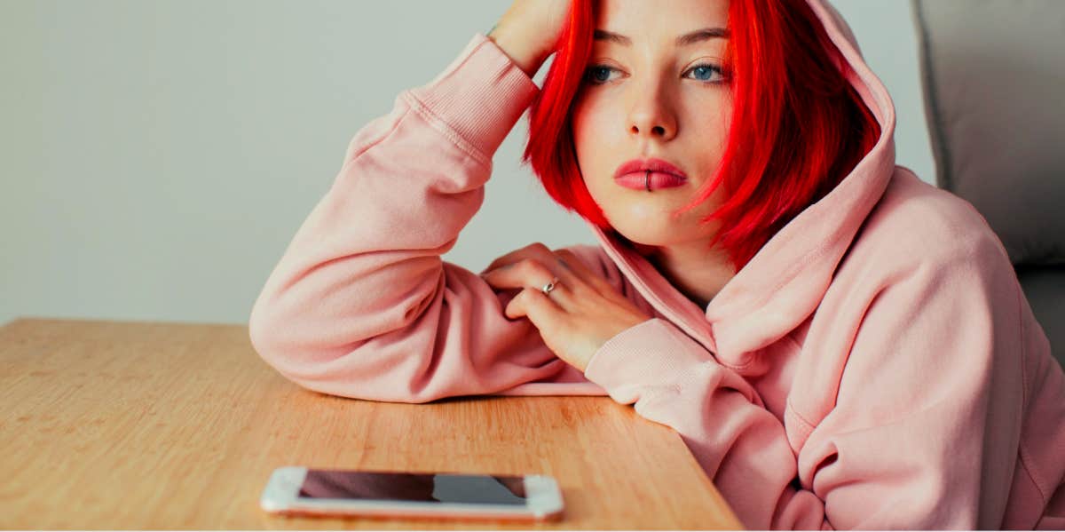 Should I Stop Texting Him? When And How To Stop Yourself sad girl trying not to text her ex