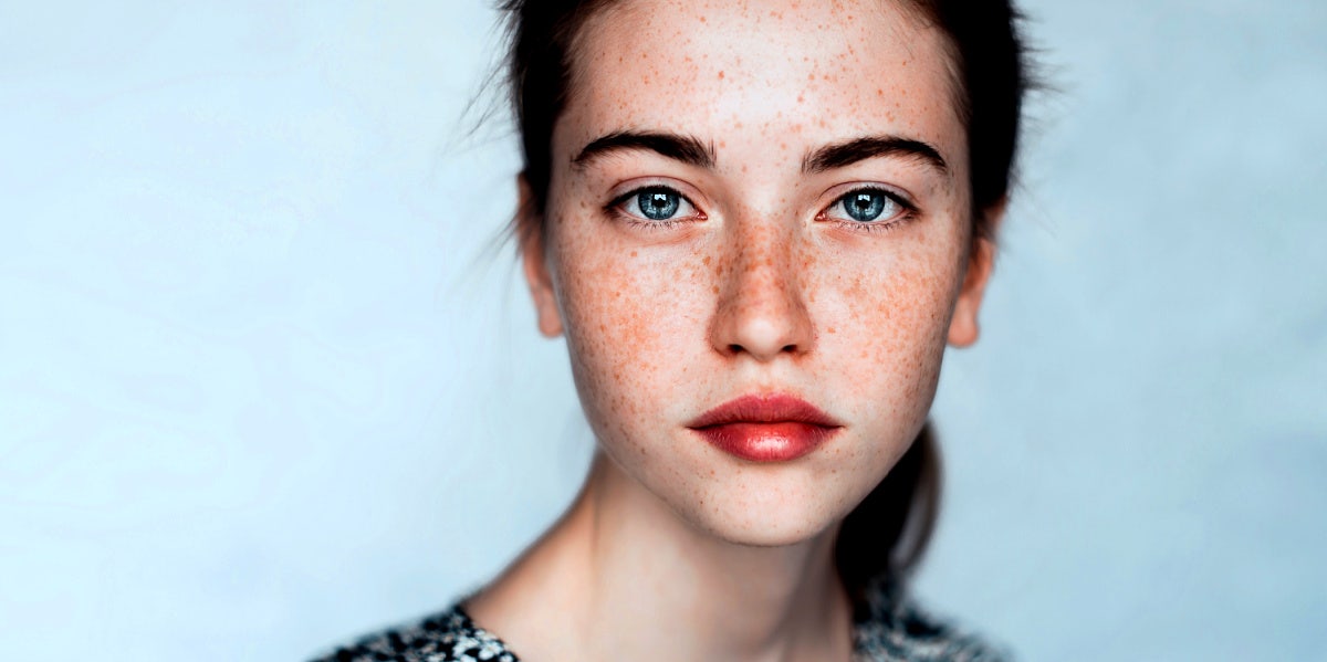 young woman looking at camera hoping to prevent hpv